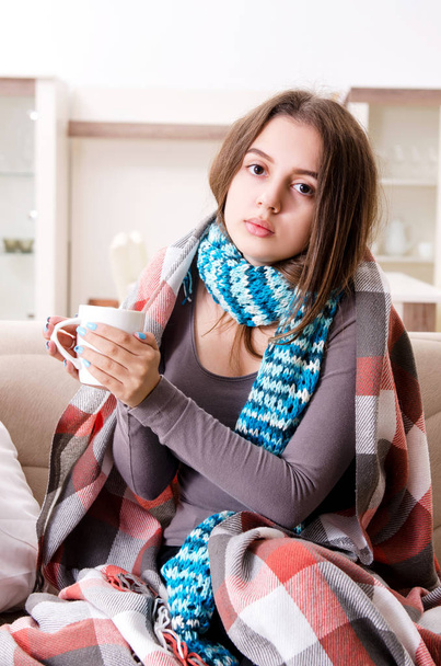 Sick young woman suffering at home  - Fotó, kép