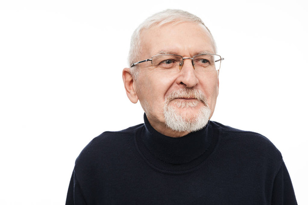 Portrait of old handsome man with gray hair and beard in eyeglas - Photo, Image