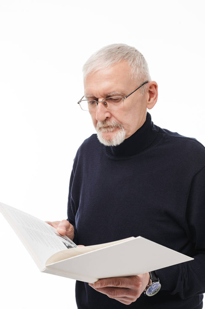 Old attractive man with gray hair and beard in eyeglasses and bl - Φωτογραφία, εικόνα