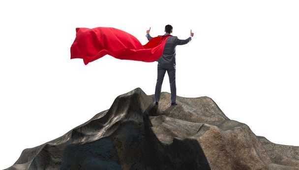 Супергеройський бізнесмен на вершині гори
 - Фото, зображення