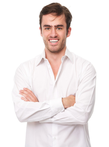 glücklicher junger Mann im weißen Hemd isoliert - Foto, Bild