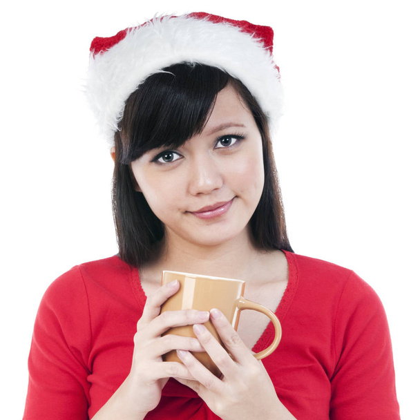 Portrait of a cute Christmas woman holding a cup, isolated on white background - Zdjęcie, obraz