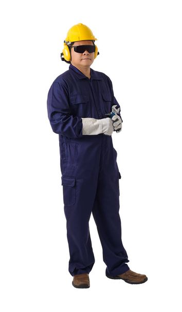 retrato de un trabajador en traje mecánico está sosteniendo una llave inglesa es
 - Foto, Imagen