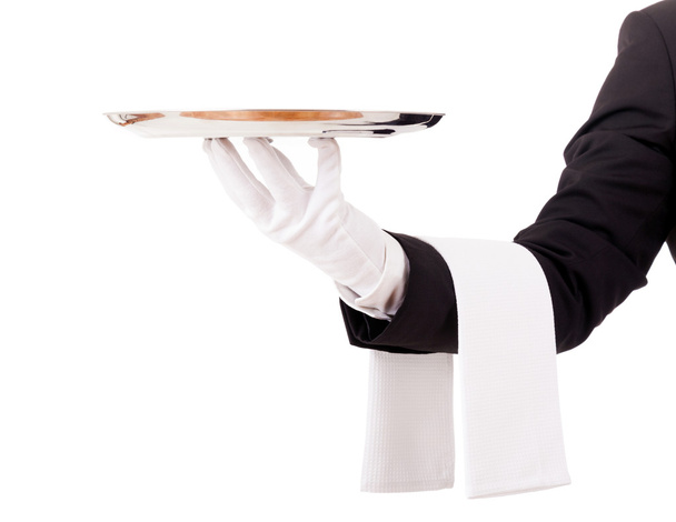 Professional waiter holding an empty dish. Isolated on white bac - Foto, afbeelding