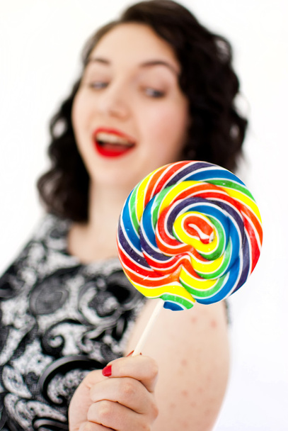 retro woman with a lollipop - Zdjęcie, obraz