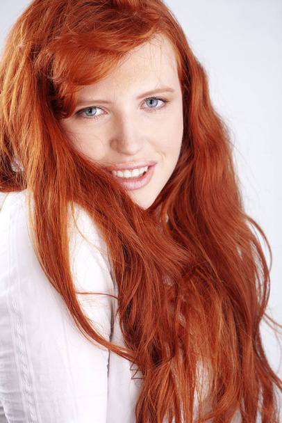 Photo of beautiful redheaded woman - Fotó, kép