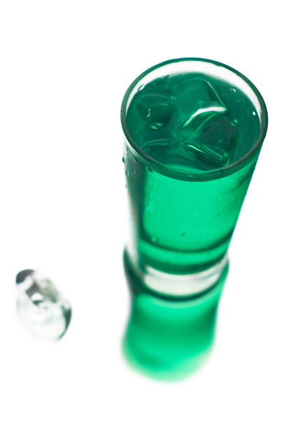 Frosty green coctail with ice in a glass on a white background - Φωτογραφία, εικόνα