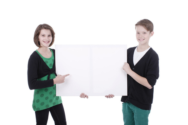 Portrait of a boy and a girl with a white placard - Foto, Imagem