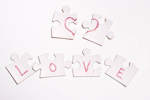 love concept with puzzle pieces - Zdjęcie, obraz
