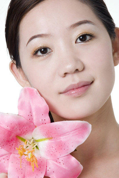 An Asian girl with beautiful skin after spa - 写真・画像