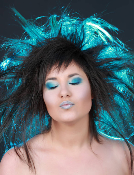 girl with blue light in her hair - Valokuva, kuva