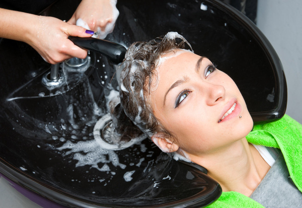 woman washing hair - 写真・画像