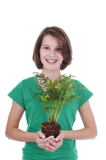 Portrait of a girl with a pot tree - Foto, Imagem