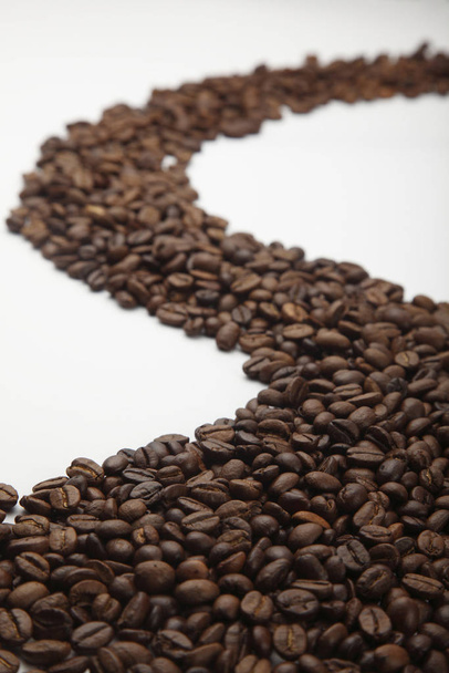 arrangment of coffee bean in a s shape - Foto, immagini
