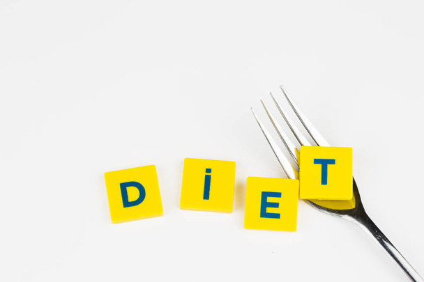 Egészséges táplálkozás, diéta szó fehér alapon - Fotó, kép
