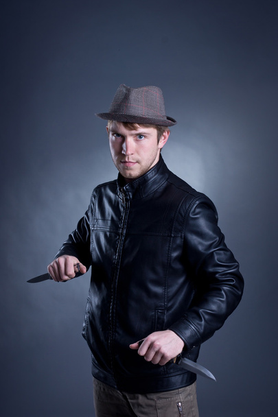 young hooligan with a knife - Foto, Imagen