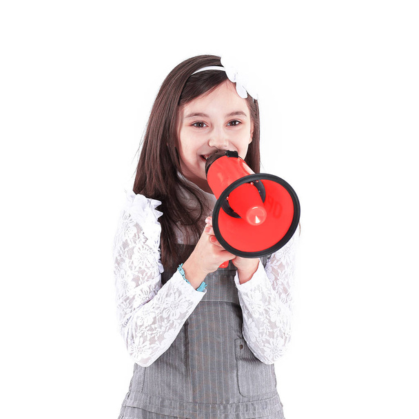 little girl with a red megaphone .isolated on white background - Фото, изображение