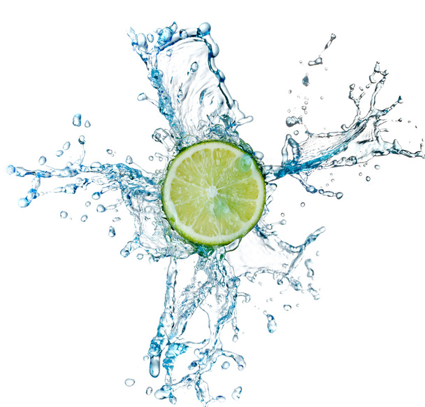 Lime and water splash on a white background - Foto, immagini