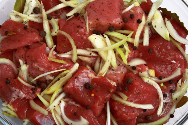 Meat with onions, pepperand salt - Valokuva, kuva