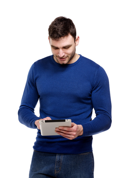 Man holding a computer tablet isolated on white background - Photo, Image