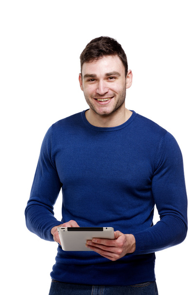 man die een computer tablet geïsoleerd op witte achtergrond - Foto, afbeelding