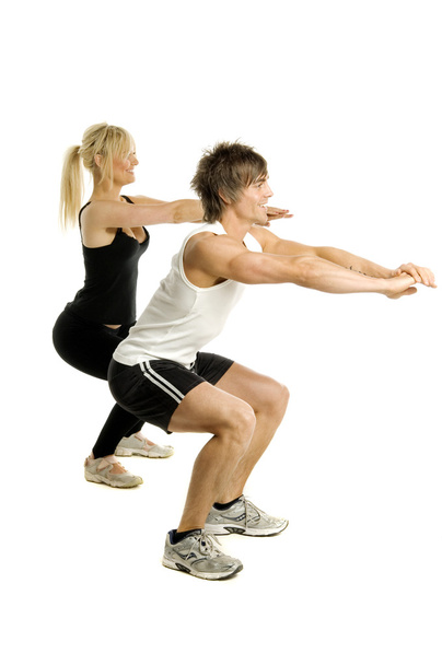 Man and woman working out isolated on a white background - Foto, Bild