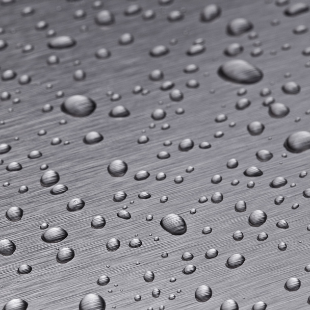 Beading νανοτεχνολογία βροχή lotuseffekt μεταλλική σφραγίδα νερό σταγόνες ρολό από h2o επιφάνεια - Φωτογραφία, εικόνα