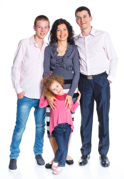 Happy Caucasian family smiling together on white background - Fotoğraf, Görsel