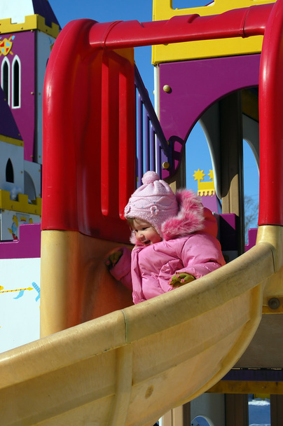 The little girl plays attractions - Fotografie, Obrázek