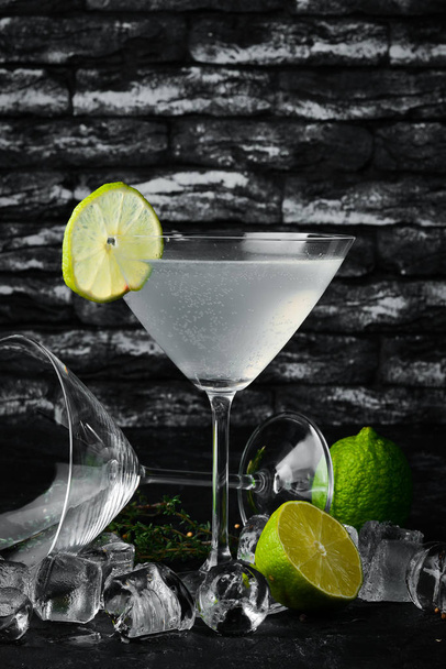 Margarita alcoholic cocktails on a black background. Top view. - Fotoğraf, Görsel