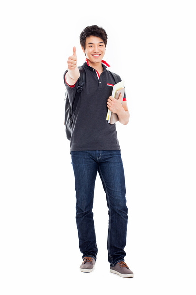 Joven asiática estudiante mostrando pulgar
 - Foto, Imagen