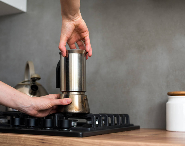 Preparing a traditional italian style coffee with coffee percolator. Making a coffe. - Фото, изображение