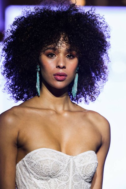NEW YORK, NY - APRIL 13: A model walks the runway  during the Watters Spring 2020 bridal fashion collection at New York Fashion Week: Bridal on April 13, 2019 in NYC. - 写真・画像