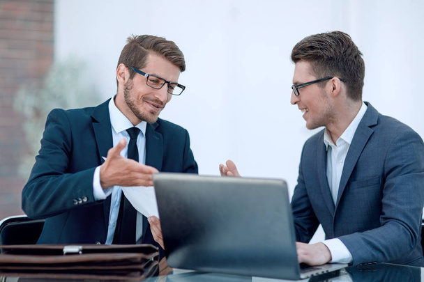 close up.two business men discussing a business document - Foto, Imagem