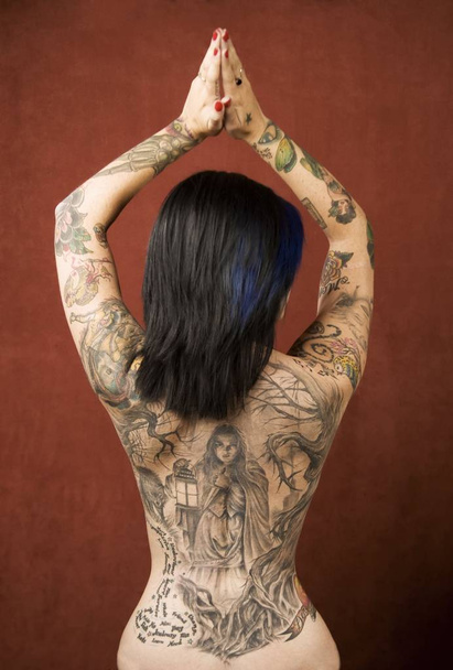 Pretty young woman with many tattoos - Fotoğraf, Görsel