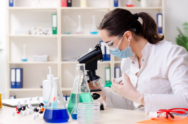 Young female chemist working in the lab  - Photo, Image
