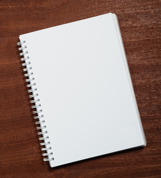 Notebook on wood background. - Foto, Imagen