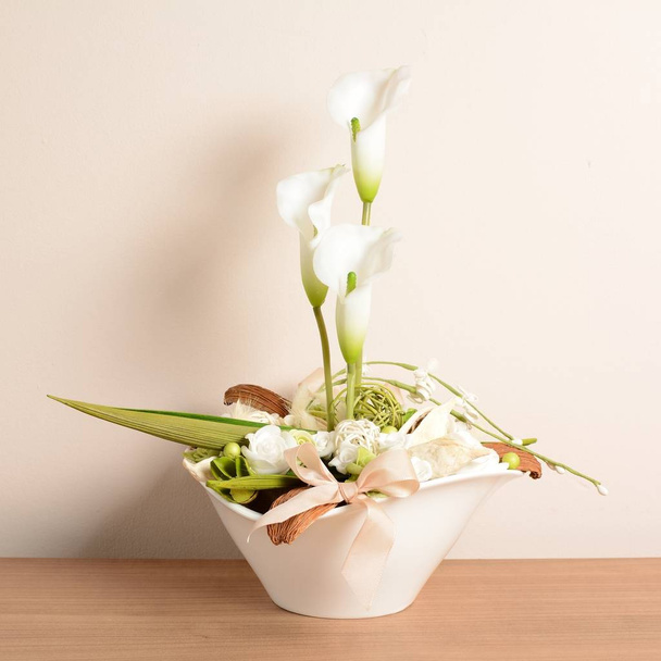 Interior decoration, decorative white calla in the white flowerpot. - Φωτογραφία, εικόνα