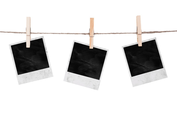 Blank instant photo hanging on the clothesline - Foto, imagen
