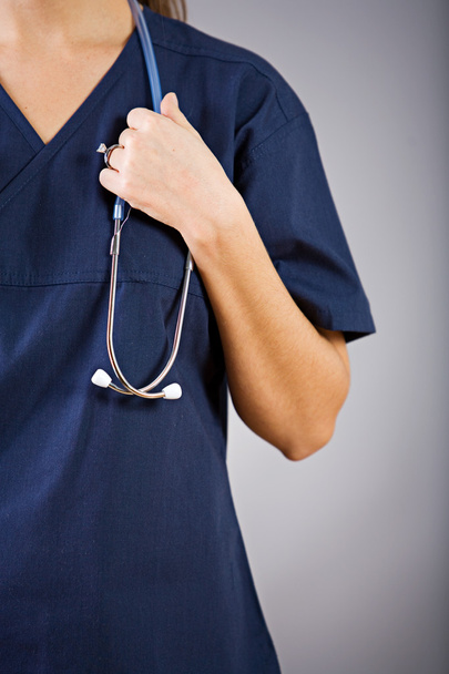Nurse: Female Nurse Holding Stethoscope - Foto, Imagen