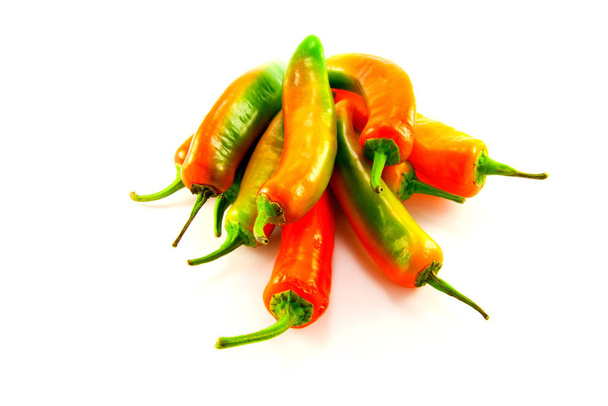 Pile of red and green chillis with clipping path on a white background - Fotoğraf, Görsel
