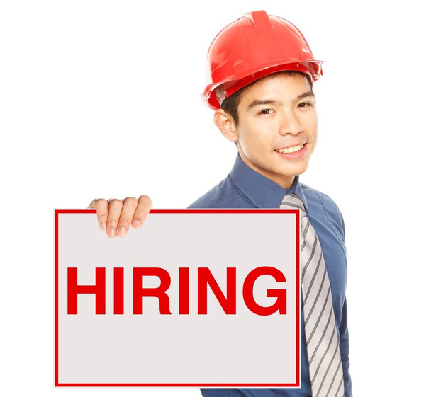 A man holding a job hiring signboard or poster - Φωτογραφία, εικόνα
