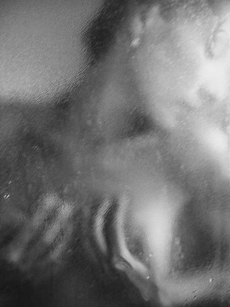 beautiful woman face silhouette behind shower glass - Фото, зображення
