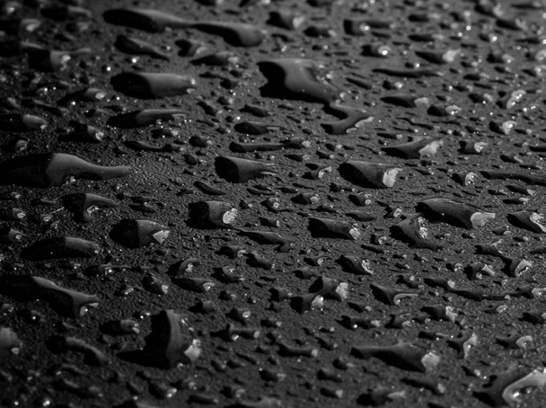 Round water drops on gray background close-up - Фото, изображение