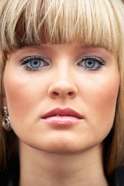 Close-up of face of young woman, full frame - Photo, Image