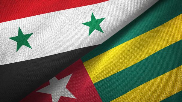Syria i Togo dwie flagi tkanina tekstylna, tekstura tkaniny - Zdjęcie, obraz