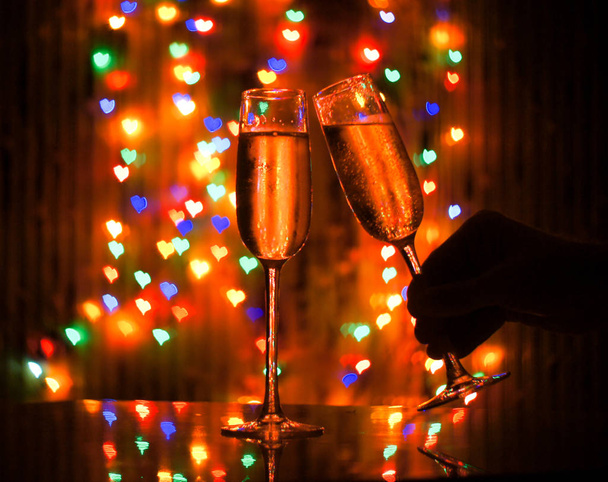 A glass of champagne on the background bokeh. For your commercial and editorial use. - Φωτογραφία, εικόνα