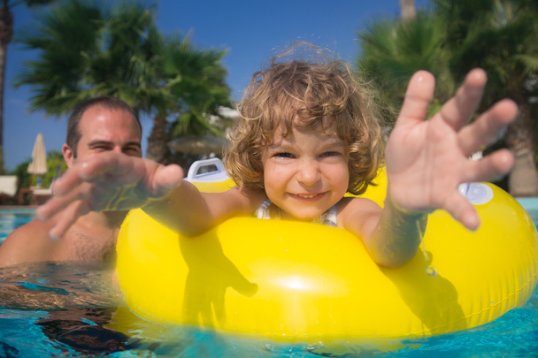 Child in swimming pool - Fotó, kép
