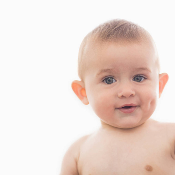 Portrait of innocent baby bay smiling at home - Valokuva, kuva