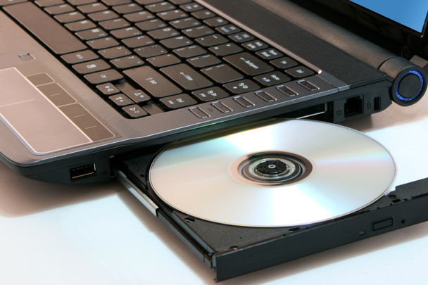 DVD on computer - Photo, Image
